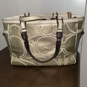 Reduced!  Coach gold colored studded hand purse, K0873-F13121